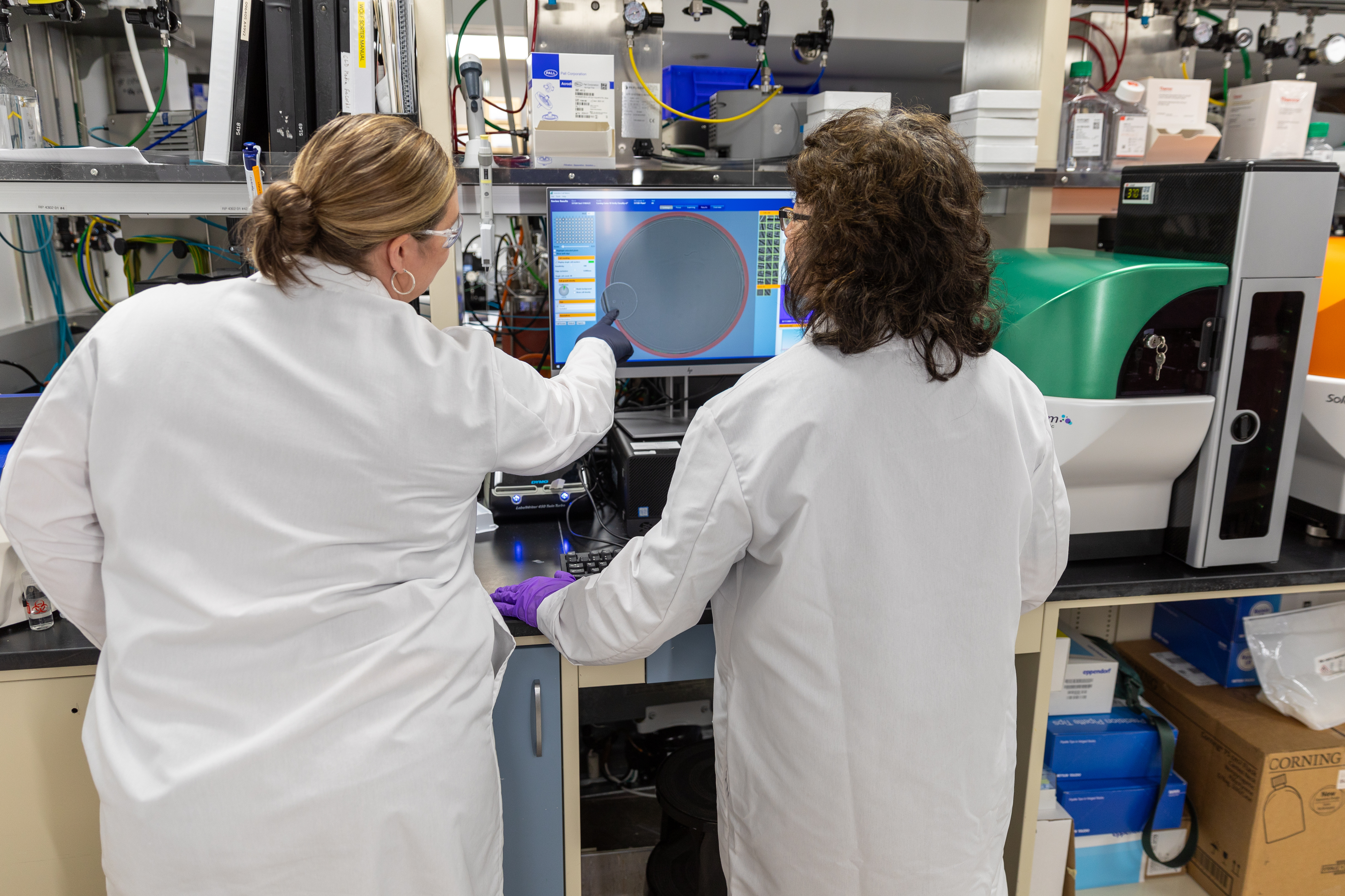 Biopharmaceutical scientists working in a lab.